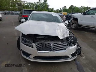 2018 Lincoln MKZ Reserve with VIN 3LN6L5E9XJR618235, listed as a IAAI auction lot 42083501 with 66,636 mi miles and . Bid and sale history available at DreamBid. Image 12.
