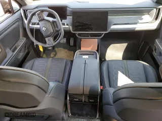 2024 Rivian R1T Adventure Package with VIN 7FCTGAAA3RN033543, listed as a Copart auction lot 65133364 with 0 mi miles and Salvage Title. Bid and sale history available at carsss.com. Image 8.