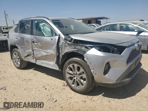 2024 Toyota RAV4 XLE Premium with VIN 2T3C1RFV1RC287814, listed as a Copart auction lot 48802135 with 3,680 mi miles and Salvage title. Bid and sale history available at DreamBid. Image 4.