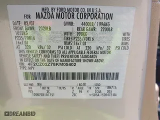 2008 Mazda Tribute Touring with VIN 4F2CZ02Z78KM05402, listed as a IAAI auction lot 42076021 with 237,405 mi miles. Bid and sale history available at carsss.com. Image 9.
