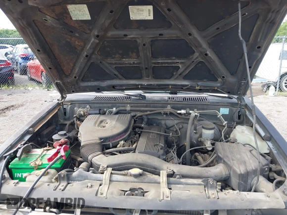 1994 Nissan Frontier z VIN 1N6SD11S2RC402971, wystawiony jako IAAI lot #42388139 z przebiegiem 122 571 mil mil oraz . Historia ofert i sprzedaży dostępna na DreamBid. Obrazek 10.