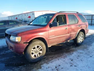 2002 Isuzu Rodeo z VIN 4S2DM58W124319936, wystawiony jako IAAI lot #41555285 z przebiegiem 143 035 mil mil oraz . Historia ofert i sprzedaży dostępna na DreamBid. Obrazek 17.