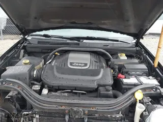 2006 Jeep Grand Cherokee Overland with VIN 1J8HR68296C308382, listed as a IAAI auction lot 41466673 with 167,028 mi miles. Bid and sale history available at carsss.com. Image 10.