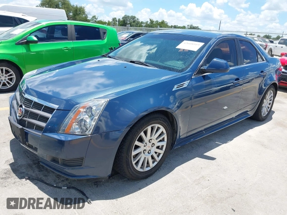 2010 Cadillac CTS Luxury with VIN 1G6DE5EG3A0115377, listed as a IAAI auction lot 42608919 with 191,657 mi miles and . Bid and sale history available at DreamBid. Image 2.