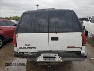 1997 GMC Suburban z VIN 1GKGK26JXVJ715765, wystawiony jako Copart lot #73188284 z przebiegiem 301 101 mil mil oraz Szkoda całkowita • Salvage title. Historia ofert i sprzedaży dostępna na DreamBid. Obrazek 6.