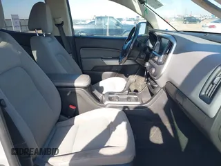 2018 Chevrolet Colorado 2WD LT z VIN 1GCGSCEN5J1300840, wystawiony jako IAAI lot #41997279 z przebiegiem 75 705 mil mil oraz . Historia ofert i sprzedaży dostępna na DreamBid. Obrazek 5.