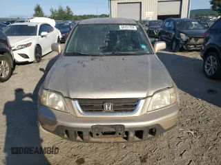 2000 Honda CR-V SE with VIN JHLRD1871YC038420, listed as a Copart auction lot 69101704 with 196,581 mi miles and Salvage Title. Bid and sale history available at carsss.com. Image 5.