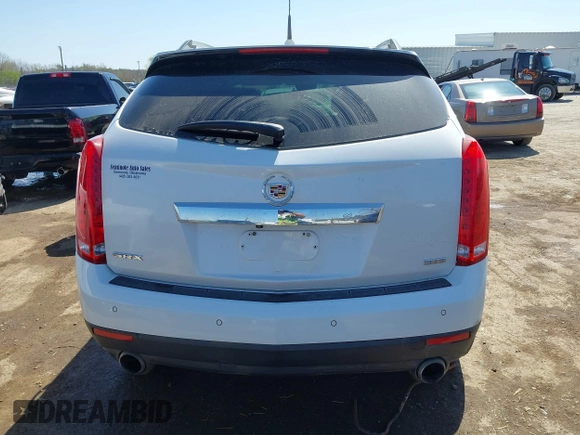 2014 Cadillac SRX Performance Collection with VIN 3GYFNCE38ES675508, listed as a IAAI auction lot 41969292 with 147,534 mi miles and . Bid and sale history available at DreamBid. Image 16.