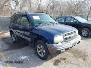 2004 Chevrolet Tracker ZR2 z VIN 2CNBJ734746917149, wystawiony jako IAAI lot #41649562 z przebiegiem 216 092 mil mil oraz . Historia ofert i sprzedaży dostępna na DreamBid. Obrazek 1.