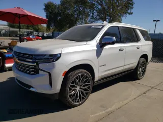 2023 Chevrolet Tahoe Premier with VIN 1GNSCSKD6PR119132, listed as a Copart auction lot 74594664 with 27,716 mi miles and Salvage Title. Bid and sale history available at carsss.com. Image 1.