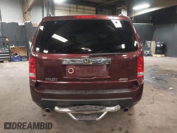 2009 Honda Pilot EX-L with VIN 5FNYF48569B021586, listed as a IAAI auction lot 41609721 with 291,598 mi miles. Bid and sale history available at carsss.com. Image 16.