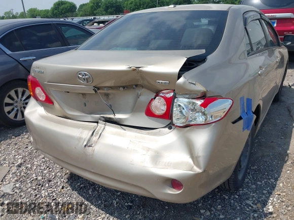2009 Toyota Corolla with VIN 1NXBU40E69Z002692, listed as a IAAI auction lot 41942713 with 127,609 mi miles. Bid and sale history available at carsss.com. Image 6.