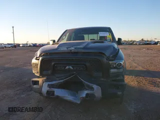 2017 Ram 1500 Rebel z VIN 1C6RR7YT0HS534465, wystawiony jako IAAI lot #41240431 z przebiegiem 125 886 mil mil oraz . Historia ofert i sprzedaży dostępna na DreamBid. Obrazek 6.