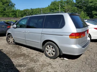 2003 Honda Odyssey EX-L z VIN 5FNRL18903B007639, wystawiony jako Copart lot #57230975 z przebiegiem 189 235 mil mil oraz Szkoda całkowita • Salvage title. Historia ofert i sprzedaży dostępna na DreamBid. Obrazek 2.