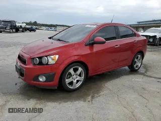2012 Chevrolet Sonic LTZ with VIN 1G1JE5SH1C4126847, listed as a Copart auction lot 47252625 with 113,399 mi miles and Salvage title. Bid and sale history available at DreamBid. Image 1.