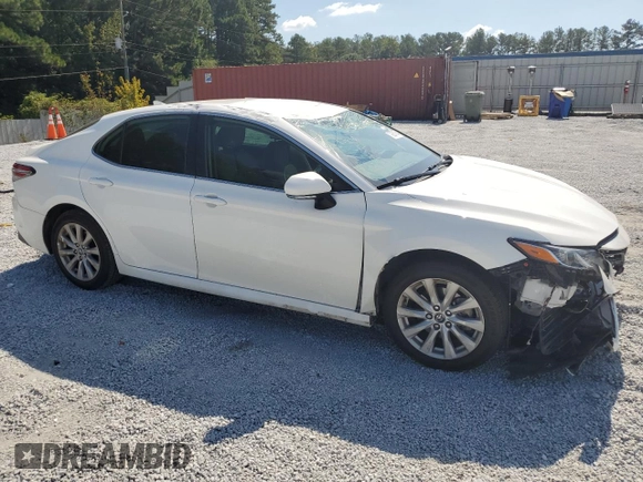 2020 Toyota Camry LE with VIN 4T1L11AK6LU900443, listed as a Copart auction lot 72664744 with 106,317 mi miles and Salvage Title. Bid and sale history available at DreamBid. Image 4.