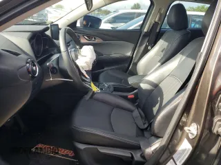 2019 Mazda CX-3 Touring z VIN JM1DKDC73K1406427, wystawiony jako Copart lot #57946715 z przebiegiem 71 838 mil mil oraz Szkody całkowita. Historia ofert i sprzedaży dostępna na DreamBid. Obrazek 7.