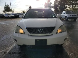 2006 Lexus RX 330 with VIN JTJGA31UX60060839, listed as a Copart auction lot 79948144 with 168,640 mi miles and Salvage Title. Bid and sale history available at DreamBid. Image 5.