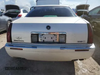 2000 Cadillac Eldorado z VIN 1G6EL12Y0YB704658, wystawiony jako Copart lot #77596814 z przebiegiem Nie podano mil oraz Nie do naprawy • Non repairable. Historia ofert i sprzedaży dostępna na DreamBid. Obrazek 6.