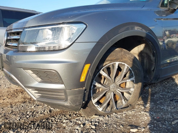 2021 Volkswagen Tiguan S with VIN 3VV0B7AX5MM000806, listed as a IAAI auction lot 40648538 with 38,224 mi miles and . Bid and sale history available at DreamBid. Image 6.