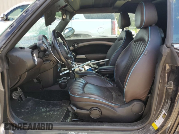 2013 MINI Convertible S with VIN WMWZP3C51DT551311, listed as a Copart auction lot 56083284 with Not provided miles and Salvage title. Bid and sale history available at DreamBid. Image 7.