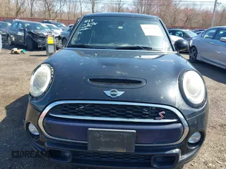 2017 MINI Hardtop 4 Door Cooper S z VIN WMWXU3C39H2F48699, wystawiony jako IAAI lot #41924423 z przebiegiem 81 249 mil mil oraz . Historia ofert i sprzedaży dostępna na DreamBid. Obrazek 12.