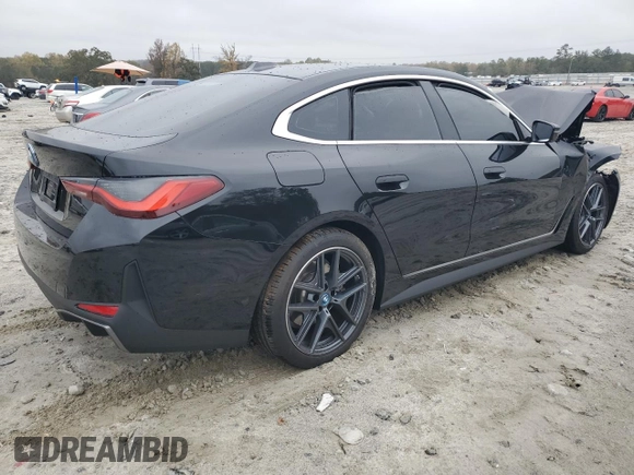 2024 BMW i4 eDrive40 with VIN WBY73AW07RFT07127, listed as a Copart auction lot 79695854 with 2,996 mi miles and Salvage Title. Bid and sale history available at carsss.com. Image 3.