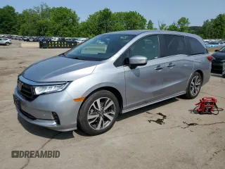 2021 Honda Odyssey Touring z VIN 5FNRL6H86MB042711, wystawiony jako Copart lot #58973755 z przebiegiem 26 358 mil mil oraz Szkoda całkowita • Salvage title. Historia ofert i sprzedaży dostępna na DreamBid. Obrazek 1.