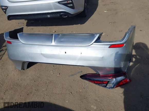 2023 Toyota Camry SE z VIN 4T1T11AK0PU153203, wystawiony jako IAAI lot #38763517 z przebiegiem 11 171 mil mil oraz . Historia ofert i sprzedaży dostępna na DreamBid. Obrazek 12.
