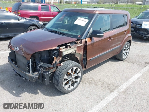 2012 Kia Soul + with VIN KNDJT2A63C7422074, listed as a IAAI auction lot 41911029 with 112,125 mi miles. Bid and sale history available at carsss.com. Image 2.