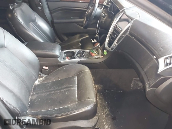 2014 Cadillac SRX Performance Collection with VIN 3GYFNFE39ES659013, listed as a IAAI auction lot 42264069 with 129,122 mi miles and . Bid and sale history available at DreamBid. Image 5.