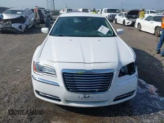 2014 Chrysler 300 z VIN 2C3CCAAG7EH327508, wystawiony jako IAAI lot #42104987 z przebiegiem 199 366 mil mil oraz . Historia ofert i sprzedaży dostępna na DreamBid. Obrazek 12.