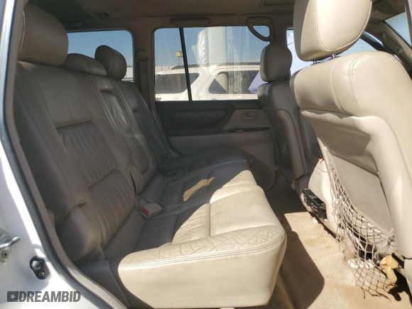 1999 Toyota Land Cruiser with VIN JT3HT05J0X0059222, listed as a Copart auction lot 77713294 with 406,869 mi miles and Clean Title. Bid and sale history available at carsss.com. Image 10.