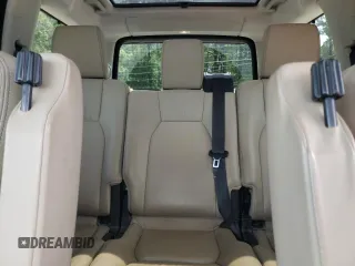 2016 Land Rover LR4 HSE Lux z VIN SALAK2V69GA784943, wystawiony jako Copart lot #61089295 z przebiegiem 125 885 mil mil oraz Szkoda całkowita • Salvage title. Historia ofert i sprzedaży dostępna na DreamBid. Obrazek 10.