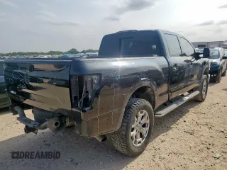 2016 Nissan Titan Platinum Reserve with VIN 1N6BA1F42GN506140, listed as a Copart auction lot 57171395 with 141,295 mi miles and Salvage title. Bid and sale history available at DreamBid. Image 3.