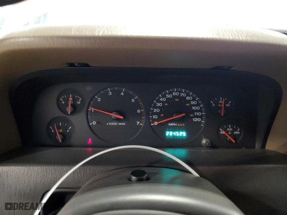 2001 Jeep Grand Cherokee Laredo with VIN 1J4GW48S91C563312, listed as a Copart auction lot 85728604 with 284,525 mi miles and Clean Title. Bid and sale history available at carsss.com. Image 9.