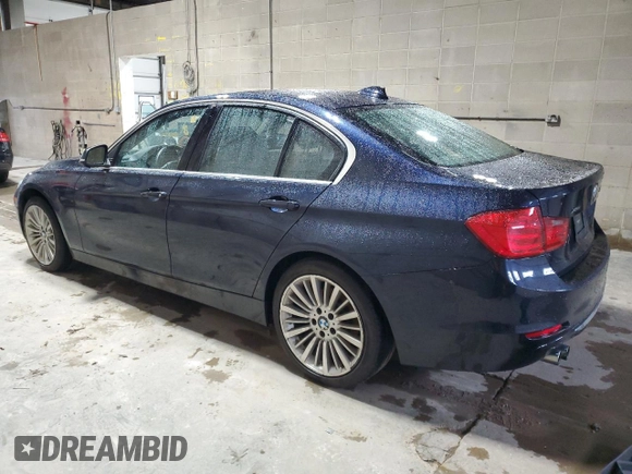 2013 BMW 3 Series 328i xDrive with VIN WBA3B3C57DF537268, listed as a Copart auction lot 57885985 with 122,050 mi miles and Salvage title. Bid and sale history available at DreamBid. Image 2.
