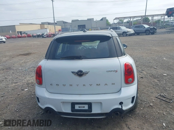 2015 MINI Countryman S with VIN WMWZC5C59FWM18935, listed as a IAAI auction lot 42427878 with 121,410 mi miles and . Bid and sale history available at DreamBid. Image 16.