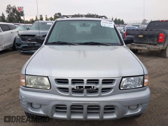 2001 Isuzu Rodeo S with VIN 4S2CK58W614361048, listed as a IAAI auction lot 41681566 with 133,460 mi miles and . Bid and sale history available at DreamBid. Image 12.