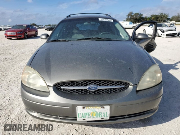 2003 Ford Taurus SE Standard with VIN 1FAFP58U33A259080, listed as a Copart auction lot 86819024 with 143,482 mi miles and Salvage Title. Bid and sale history available at carsss.com. Image 5.