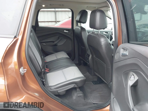 2017 Ford Escape Titanium with VIN 1FMCU9J99HUB75687, listed as a IAAI auction lot 41180789 with 108,967 mi miles. Bid and sale history available at carsss.com. Image 8.