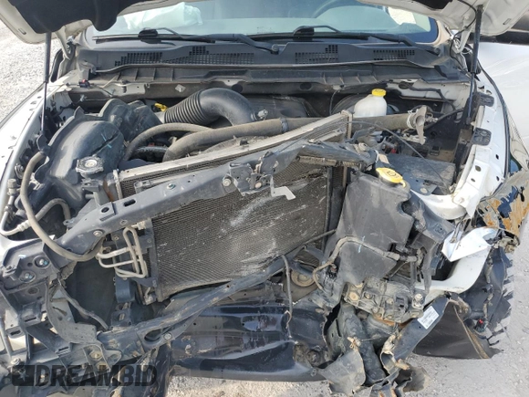 2016 Ram 1500 Tradesman z VIN 3C6RR7KT1GG225540, wystawiony jako Copart lot #58956275 z przebiegiem 172 937 mil mil oraz Szkoda całkowita • Salvage title. Historia ofert i sprzedaży dostępna na DreamBid. Obrazek 11.