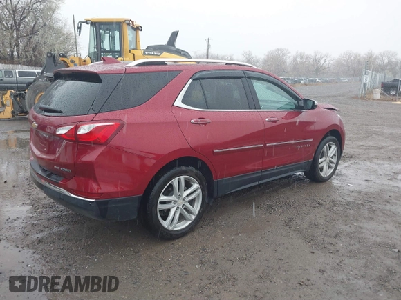 2018 Chevrolet Equinox Premier with VIN 2GNAXVEVXJ6115268, listed as a IAAI auction lot 40881577 with 61,910 mi miles and . Bid and sale history available at DreamBid. Image 4.