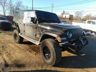 2021 Jeep Wrangler Unlimited Sahara z VIN 1C4HJXEG1MW579887, wystawiony jako IAAI lot #41299338 z przebiegiem 50 707 mil mil oraz . Historia ofert i sprzedaży dostępna na DreamBid. Obrazek 1.
