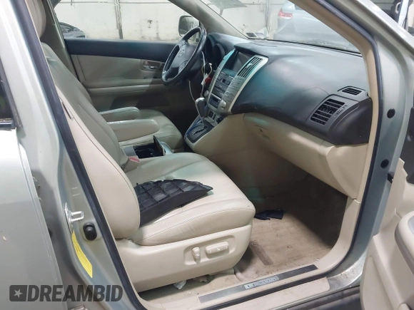 2006 Lexus RX 400h with VIN JTJHW31U960011640, listed as a IAAI auction lot 42256550 with 53,884 mi miles and . Bid and sale history available at DreamBid. Image 5.