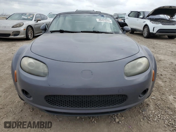 2007 Mazda MX-5 Miata Sport z VIN JM1NC25F970134960, wystawiony jako Copart lot #48422265 z przebiegiem 149 357 mil mil oraz Czysty tytuł • Clean title. Historia ofert i sprzedaży dostępna na DreamBid. Obrazek 5.