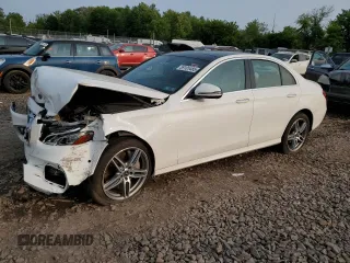 2018 Mercedes-Benz E 300 with VIN WDDZF4KB3JA344483, listed as a Copart auction lot 59105485 with Not provided miles and Salvage title. Bid and sale history available at DreamBid. Image 1.