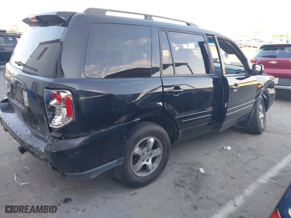 2006 Honda Pilot EX-L with RES with VIN 5FNYF28616B029670, listed as a IAAI auction lot 41425494 with 206,756 mi miles. Bid and sale history available at carsss.com. Image 4.