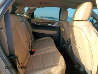 2022 Cadillac XT5 Premium Luxury FWD z VIN 1GYKNERS9NZ120517, wystawiony jako Copart lot #58978045 z przebiegiem 31 456 mil mil oraz Szkoda całkowita • Salvage title. Historia ofert i sprzedaży dostępna na DreamBid. Obrazek 11.
