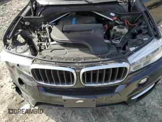 2016 BMW X5 xDrive40e z VIN 5UXKT0C59G0S77407, wystawiony jako Copart lot #50094255 z przebiegiem 93 264 mil mil oraz Szkoda całkowita • Salvage title. Historia ofert i sprzedaży dostępna na DreamBid. Obrazek 13.